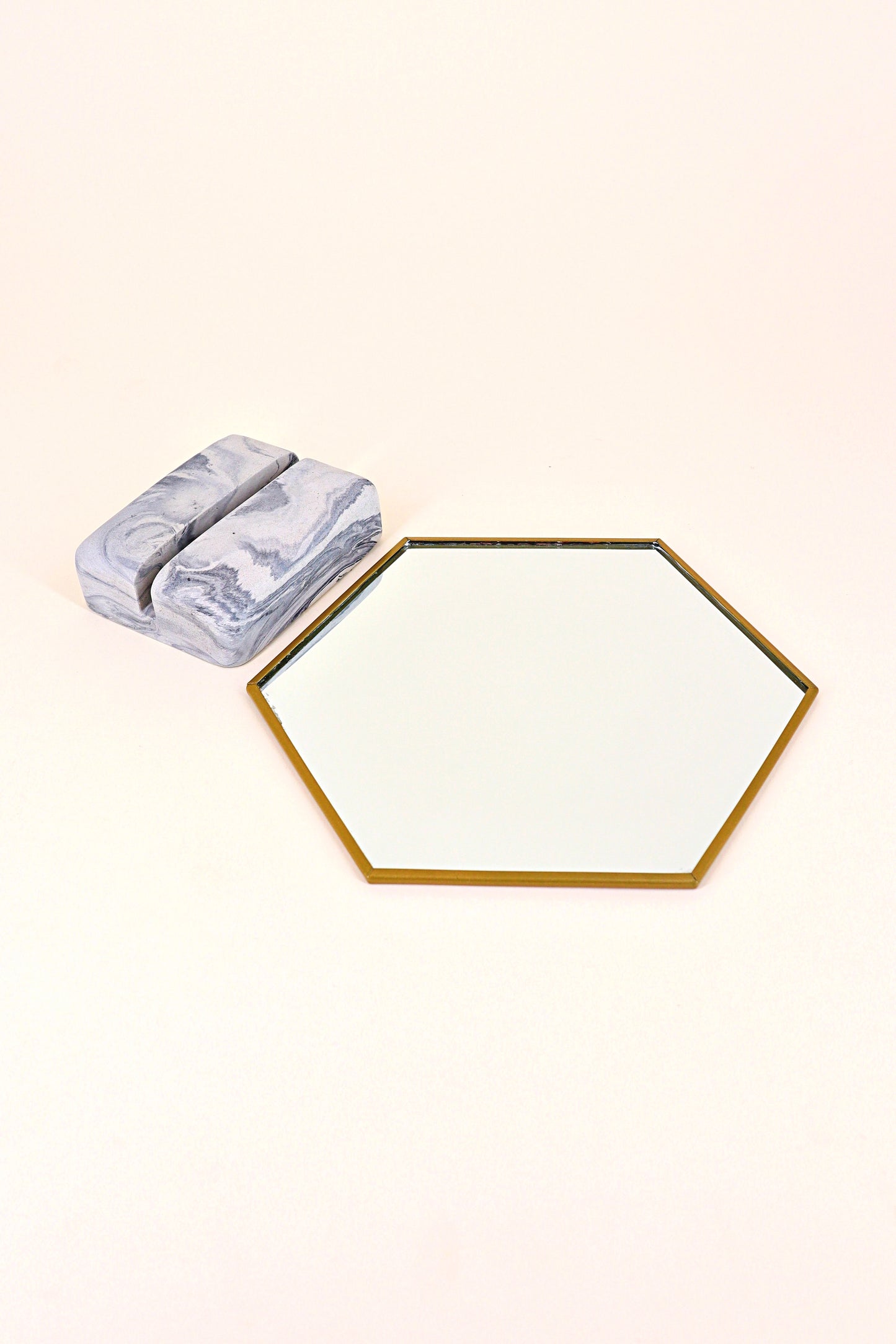 Mirror with ceramic stone base